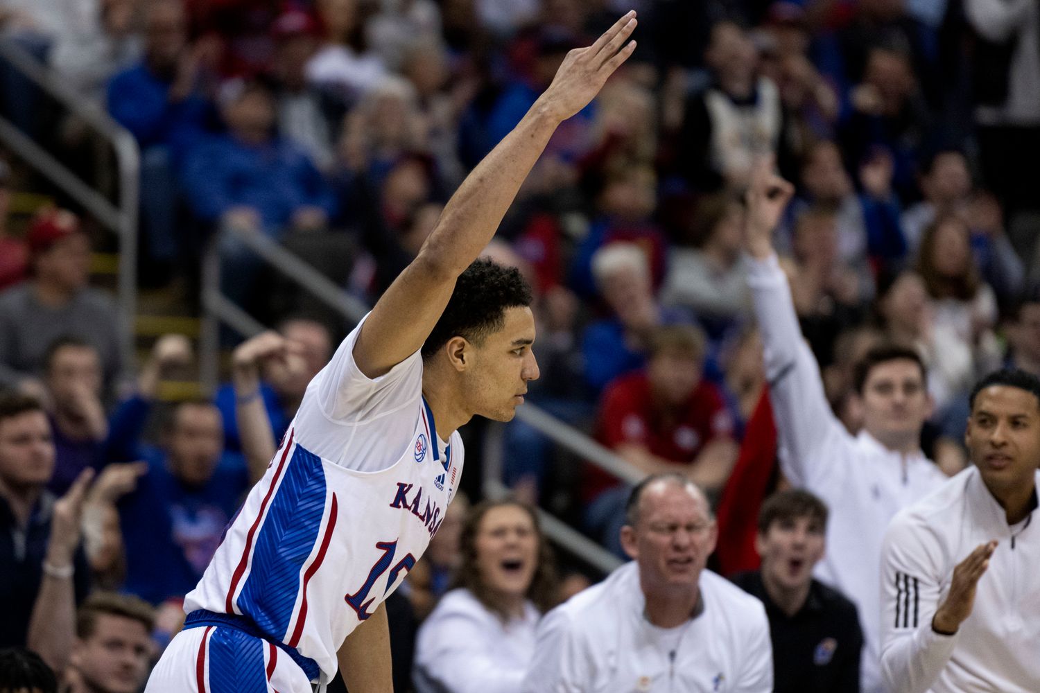 Mar 9, 2023; Kansas City, MO, USA; Kansas Jayhawks guard Kevin McCullar Jr. (15) celebrates a made three-point attempt against the West Virginia Mountaineers in the second half at T-Mobile Center. Mandatory Credit: Amy Kontras-USA TODAY Sports